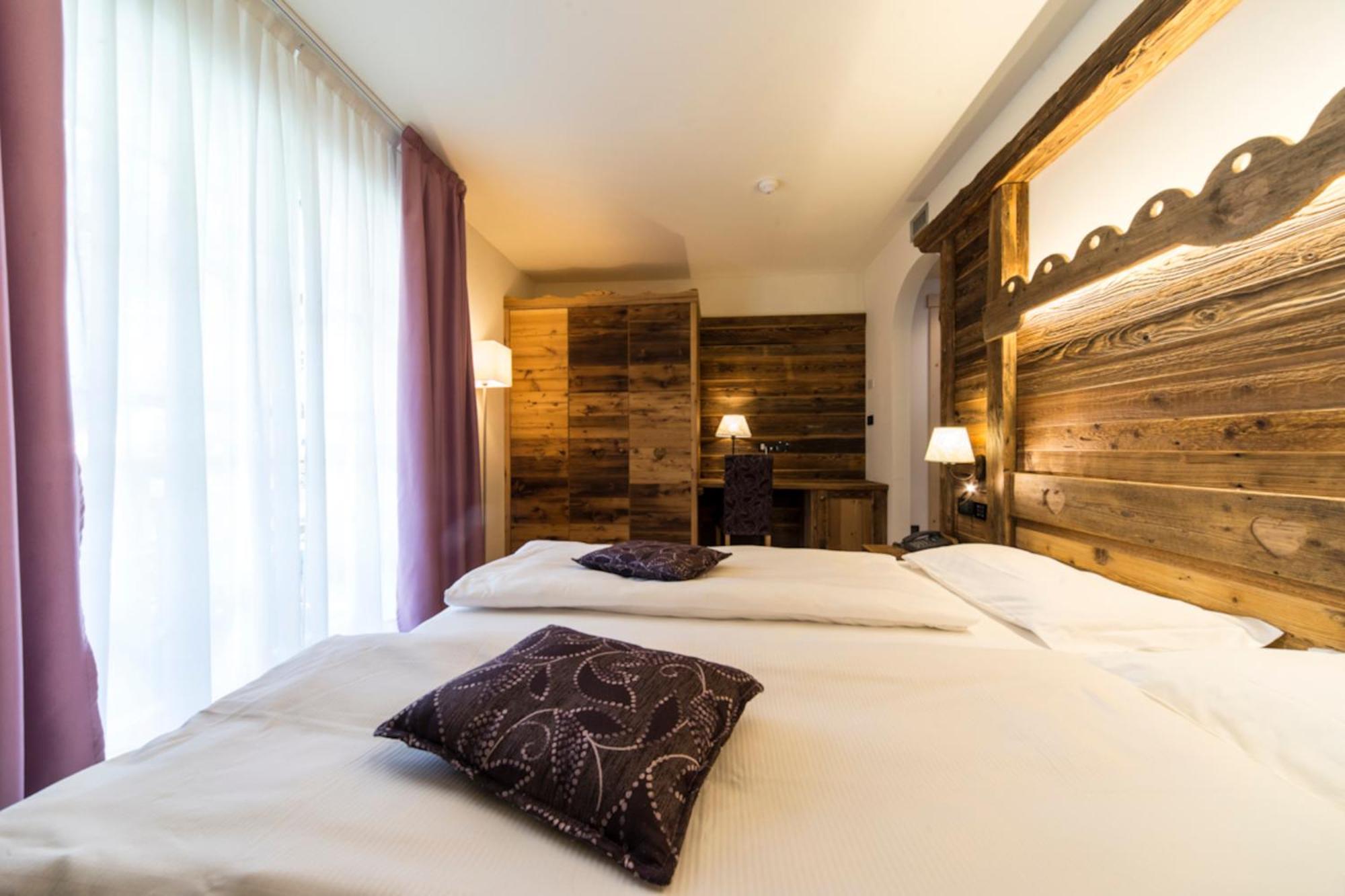 Alpholiday Dolomiti Wellness & Family Hotel ディマーロ 部屋 写真
